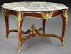 Louis XV style round salon table with bronze