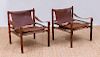 PAIR OF ARNE NORELL ROSEWOOD AND LEATHER 'SAFARI' CHAIRS