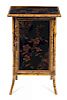 An English Lacquered Bamboo Cabinet Height 39 1/2 x width 50 3/4 x depth 24 inches.