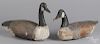 Two carved and painted Canada goose decoys.