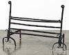 Pair of wrought iron andirons with crossbars
