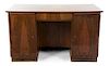 An Art Deco Rosewood Desk, Height 31 3/4 x width 55 1/4 x depth 31 inches.