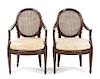 A Pair of Italian Walnut Fauteuils Height 36 inches.