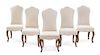 A Set of Ten Italian Walnut Dining Chairs Height 39 1/4 inches.