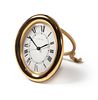 A Cartier Brass Travel Alarm Clock Height 3 1/2 inches.