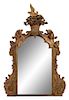 An Italian Rococo Carved Giltwood Overmantle Mirror Height 62 x width 45 inches.