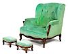 A Louis XV Style Carved Wood and Green Velvet Upholstered Wingback Chair Height 39 x width 36 1/2 inches.