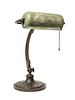 A Handel Mosserine Glass and Bronze Student Lamp, Width of shade 15 1/2 x height overall 15 1/2 inches.