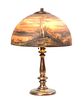 A Handel Reverse Painted Glass Table Lamp, Diameter of shade 16 x height overall 22 1/2 inches.