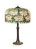 An American Leaded Glass and Bronze Table Lamp, Diameter of shade 18 1/2 x height overall 27 1/4 inches.