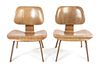 A Pair of Charles and Ray Eames Bentwood LCW Lounge Chairs, American (1907-1978), (1912-1988), Height 26 inches.