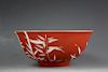 Chinese coral red glazed porcelain bowl depicting Bamboo