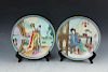 12 Porcelain plates depicting characters from  Dream of
