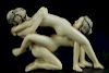 Vintage Netsuke carving of threesome erotic
