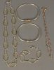 Five piece lot including two gold and silver necklaces, and three gold and silver bracelets.