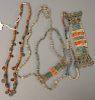 Group of five Egyptian Faience necklaces and bracelets.