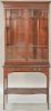 Mahogany inlaid stepback cabinet having two glass doors over two drawers. ht. 79 1/2in., wd. 35in., dp. 16 1/2in.