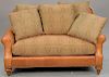 Grange leather loveseat with cloth upholstered cushions, made exclusively for Grange. ht. 36in., wd. 59in.