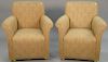 Pair of upholstered Swaim easy chairs.
