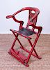CHINESE BRASS-MOUNTED RED LACQUER HORSESHOE-BACK FOLDING CHAIR