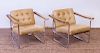 PAIR OF HANS EICHENBERGER CHROME AND LEATHER ARMCHAIRS, RETAILED BY STENDIG
