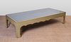 LARGE GREEN PAINTED AND PARCEL-GILT LOW TABLE