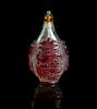 A Peking Glass Red Overlay Snuff Bottle, Height 3 inches.