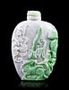 A Carved Jadeite Snuff Bottle, Height 3 3/8 inches.