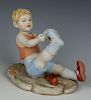 Capodimonte Benacchio Figurine "Boy Pulling Sock"