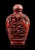 A Carved Cinnabar Lacquer Snuff Bottle, Height overall 3 inches.
