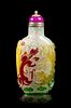 A Peking Glass Five-Color Overlay Snuff Bottle, Height 2 3/4 inches.