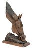 A Brazilian Carved Wood Sculpture of a Horse Feeding20TH CENTURYinscribed De Rodriguez '95.Height 23 inches.