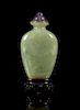 A Jadeite Snuff Bottle, Height overall 3 1/4 inches.