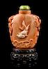 A Carved Coral Snuff Bottle, Height 2 1/8 inches.