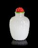 A White Glass Simulating Jade Snuff Bottle, Height 2 1/4 inches.