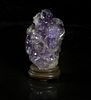 A Carved Amethyst Quartz Snuff Bottle, Height overall 3 1/4 inches.