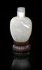 A Carved Opal Snuff Bottle, Height 2 1/4 inches.