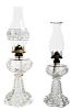 Two Pressed Colorless Glass Oil Lamps, Height of taller 9 1/2 inches.