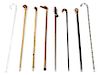 A Collection of Eight Canes and Walking Sticks, Height of tallest 39 3/4 inches.