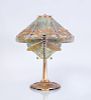 AMERICAN ART NOUVEAU GILT-BRONZE AND STAINED GLASS 'DRAGONFLY' TABLE LAMP