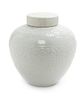 A White Glazed Molded Porcelain Covered Jar Height 8 1/4 inches.
