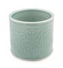 A Celadon Porcelain Brushpot Height 6 1/2 inches.