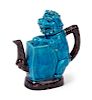 A Turquoise Glazed Porcelain Cadogan Teapot Height 7 1/4 inches.