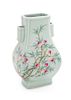 A Celadon Ground Famille Rose Porcelain Hu Vase Height 11 1/8 inches.