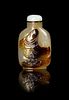 * A Carved Agate Snuff Bottle Height 2 3/4 inches.