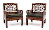 A Pair of Chinese Rosewood Armchairs Height 34 x length 26 1/2 x depth 24 3/4 inches.