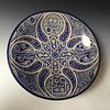 A PERSIAN ANTIQUE PLATE. MARKED