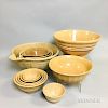 Twelve Mostly Banded Yellowware Pottery Bowls