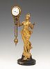 Art nouveau swinger clock, gilt bronze figure of a woman