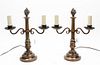 * A Pair of Bronze Two-Light Candlesticks Height 16 inches.